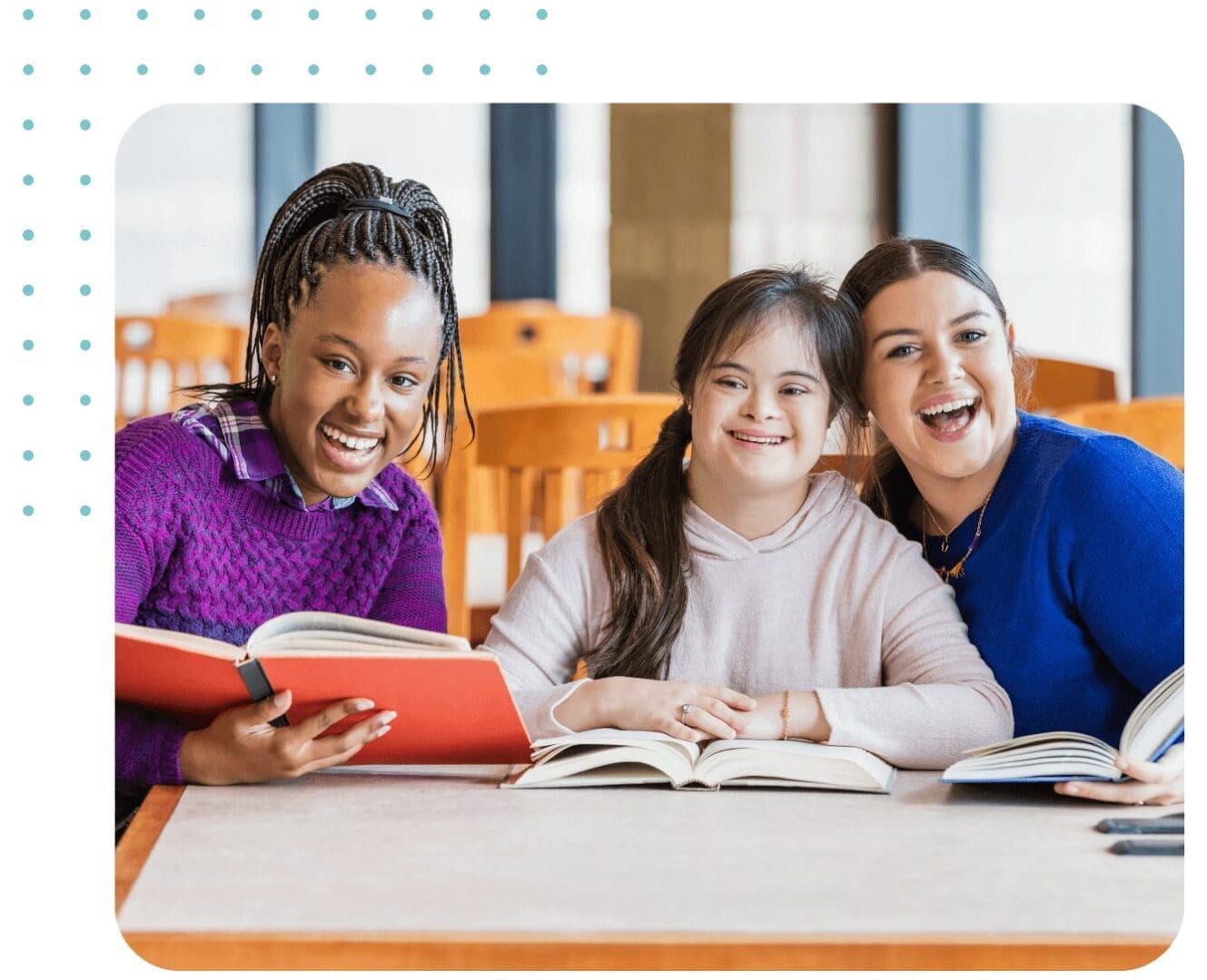 Three friends studying together in library