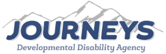 Journeys logo with mountain background.