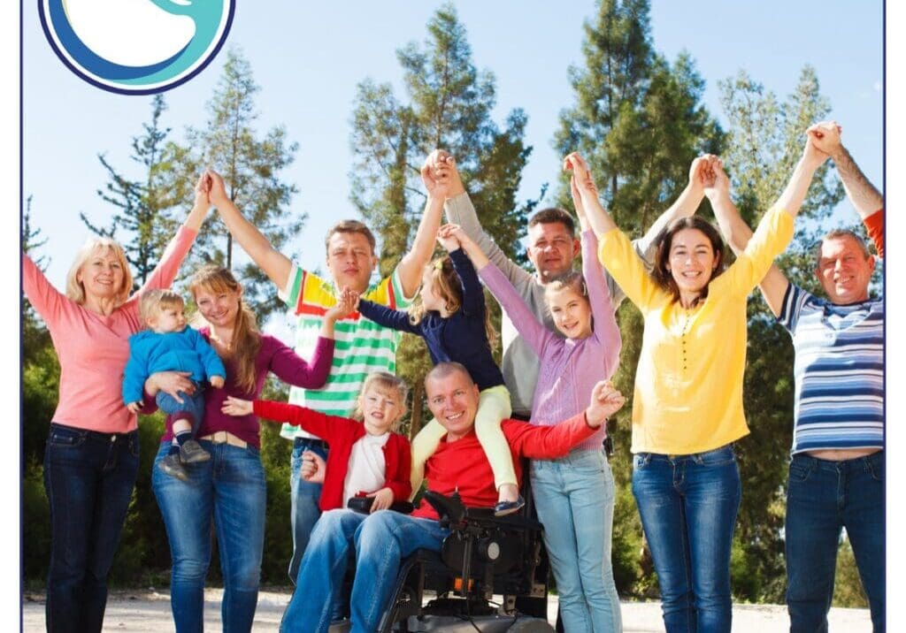 Diverse group celebrating outdoors with smiles.